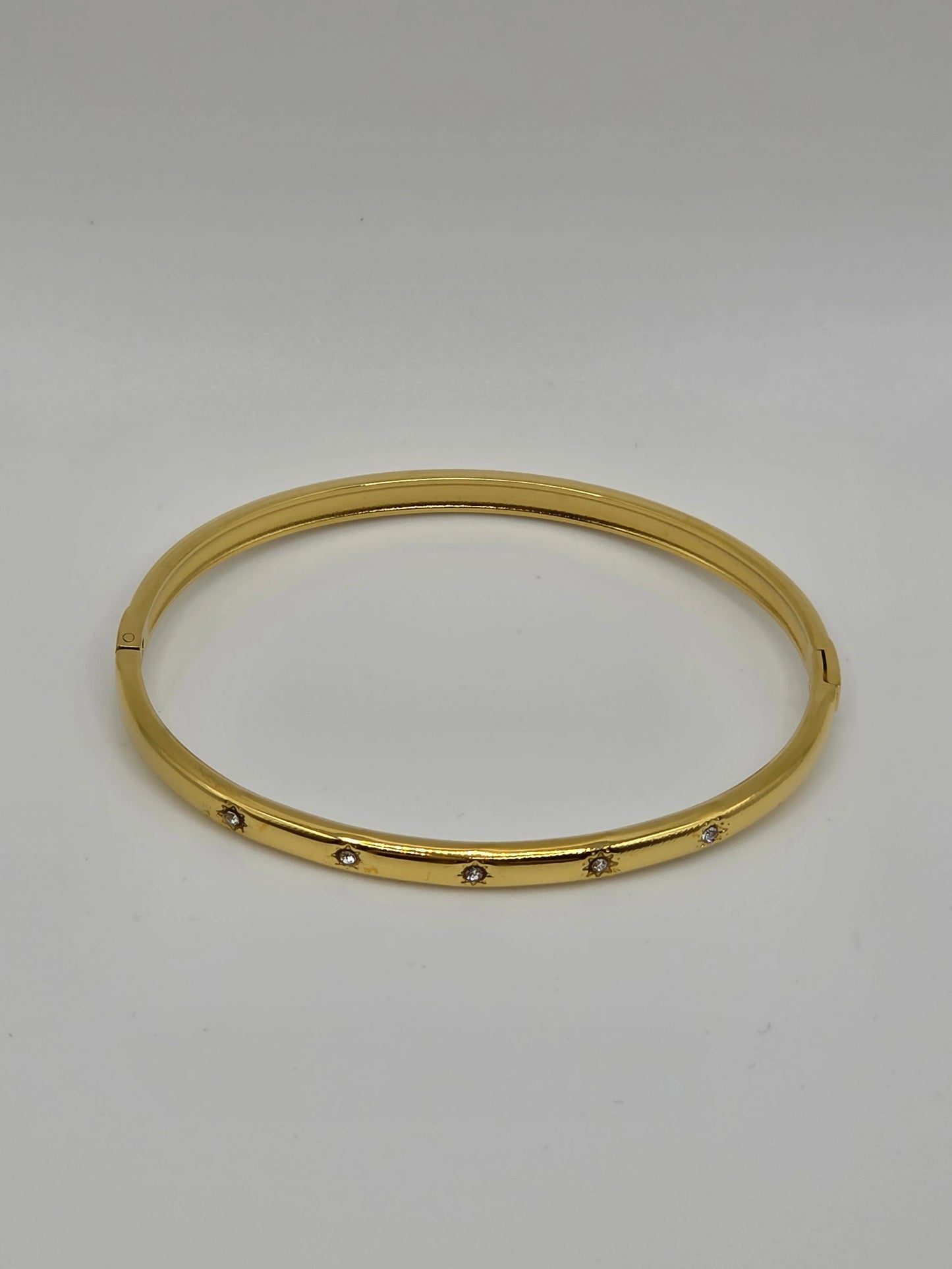 Golden Glow: Slim Designer-Inspired Gold-Plated Starburst Bangle