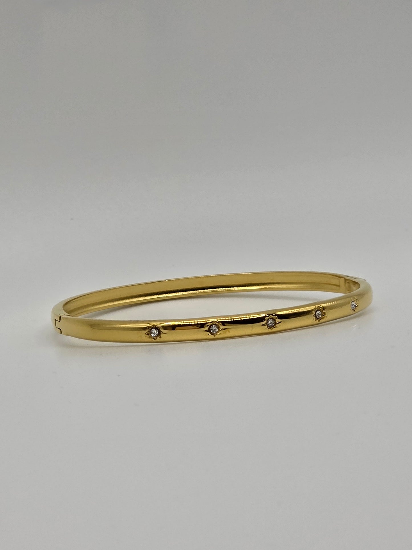 Golden Glow: Slim Designer-Inspired Gold-Plated Starburst Bangle
