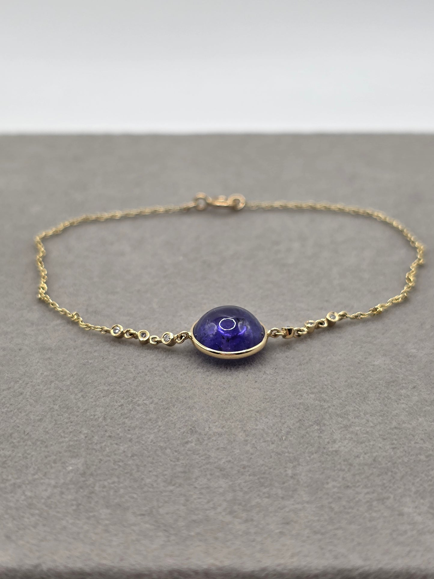 Golden Aura – 14K Yellow Gold & Tanzanite Cable Bracelet