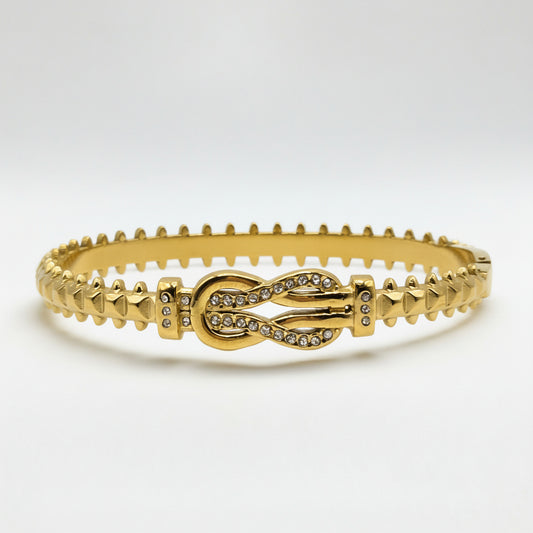Gold bracelet with intricate design on a white background Danavi Aurum