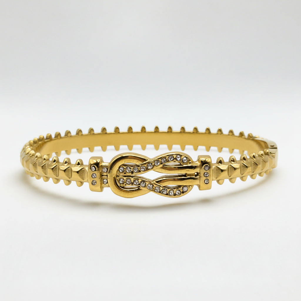 Gold bracelet with intricate design on a white background Danavi Aurum