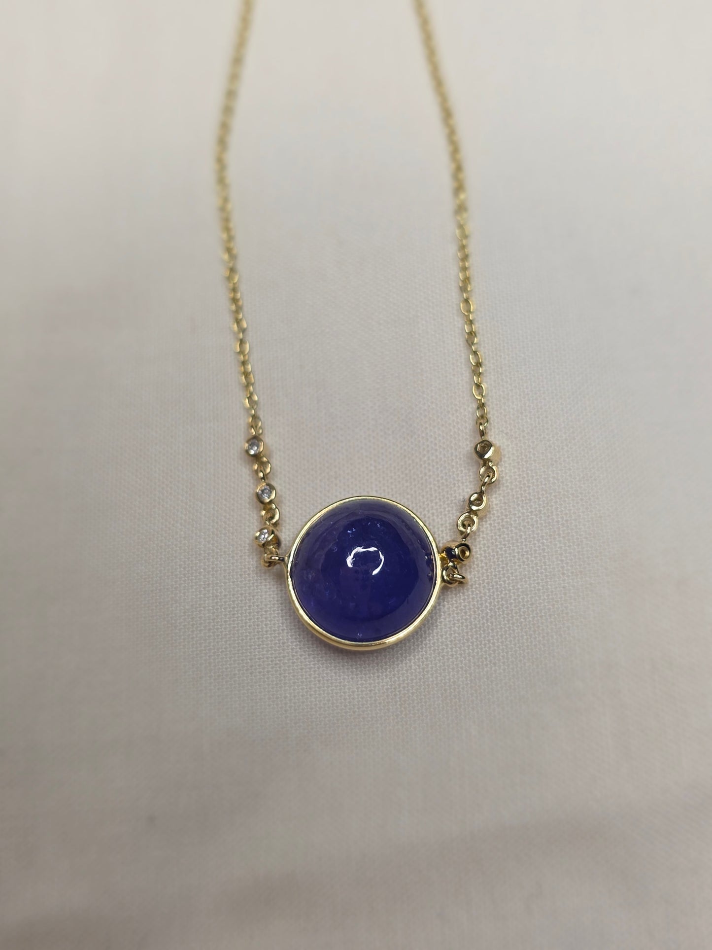 Golden Aura – 14K Yellow Gold & Tanzanite Cable Bracelet