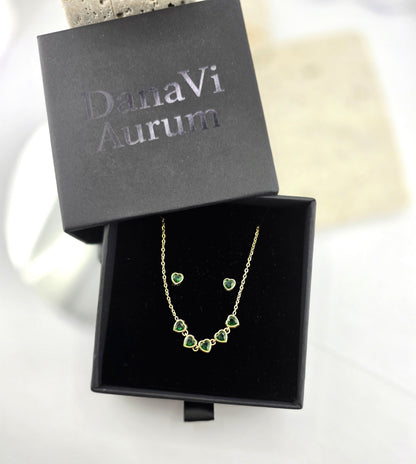 Jewelry set with necklace and earrings in a Danavi Aurum box on a white background