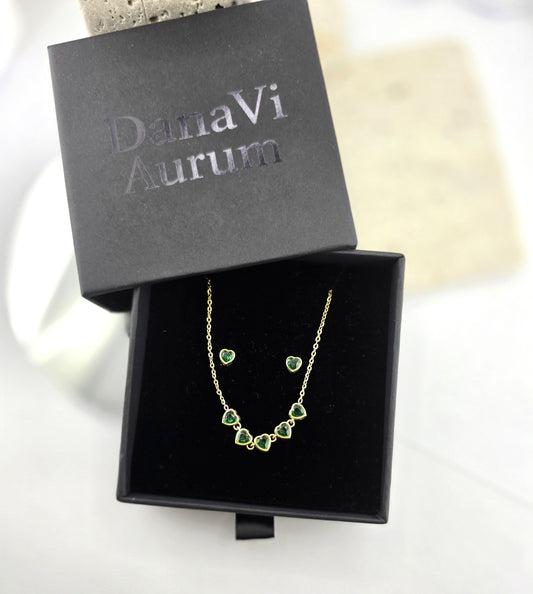 Jewelry set with necklace and earrings in a Danavi Aurum box on a white background