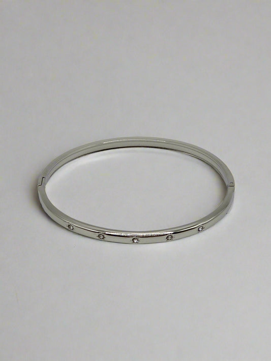Minimal Sparkle: Sleek Silver-Plated Bangle – Designer-Inspired Stainless Steel