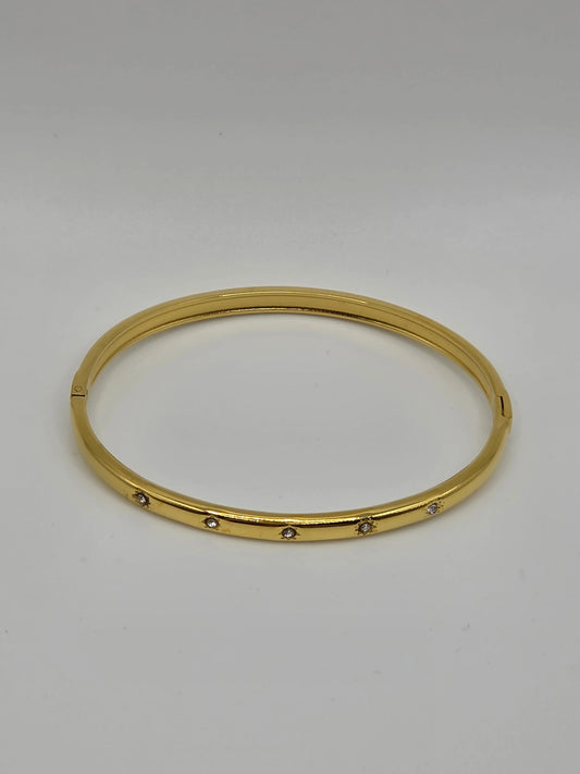 Golden Glow: Slim Designer-Inspired Gold-Plated Starburst Bangle