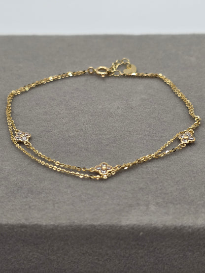 Timeless Elegance – 14K Gold Dainty Flower Charm Adjustable Bracelet