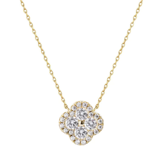 Gold necklace with a diamond flower pendant on a white background danavi aurum