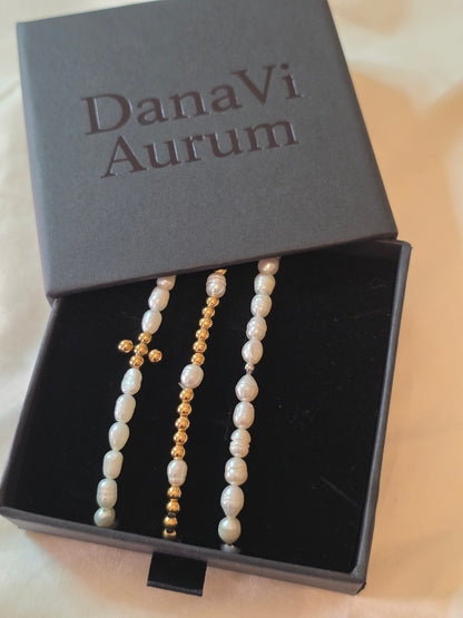 Pearl and gold bracelets in a DanaVi Aurum box