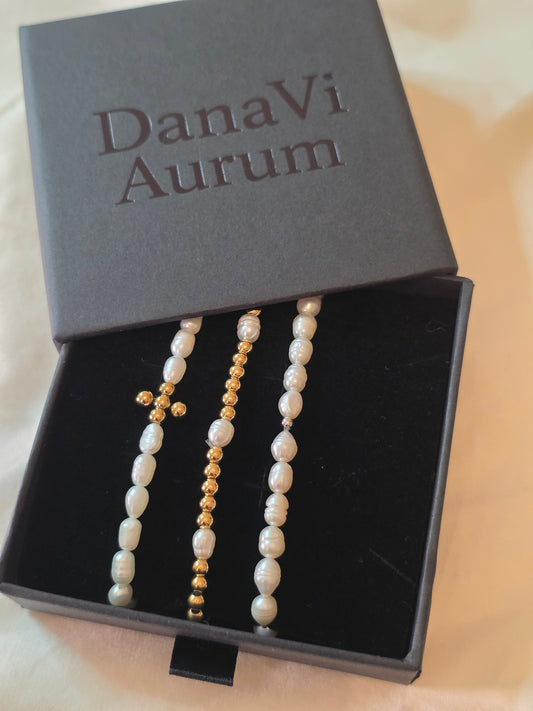 Pearl and gold bracelets in a DanaVi Aurum box