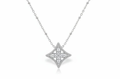 silver necklace with a diamond pendant on a white background